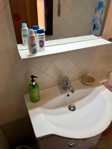 Kúpeľňa v ubytovaní Cottage Gole Alcantara Pafumi