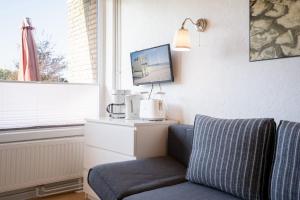 Posezení v ubytování Blankwasserweg 131 Lensterstrand Oase Bungalow 3