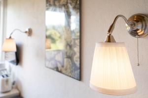 Postel nebo postele na pokoji v ubytování Blankwasserweg 131 Lensterstrand Oase Bungalow 3