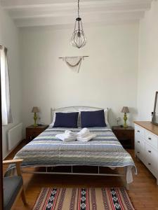 Postel nebo postele na pokoji v ubytování Vorino house