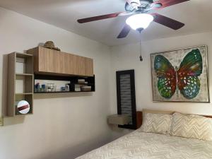 Una cama o camas en una habitación de Cozy house in Alto Boquete