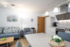 Kuchyň nebo kuchyňský kout v ubytování Strandresidenz Wohnung 1