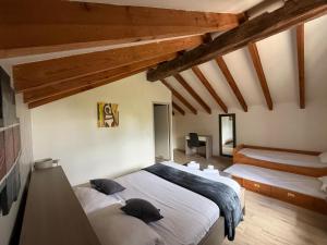 Ένα ή περισσότερα κρεβάτια σε δωμάτιο στο Ferme auberge du col de la vaccia