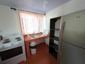 Kuchyň nebo kuchyňský kout v ubytování Hotel Los Ranchos