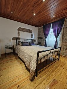 Ένα ή περισσότερα κρεβάτια σε δωμάτιο στο Casa Moreirinha