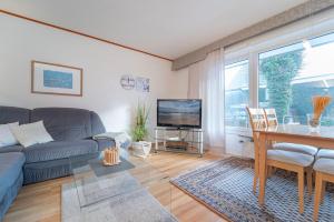 TV a/nebo společenská místnost v ubytování Fischerstraße 10a Zum Möwennest