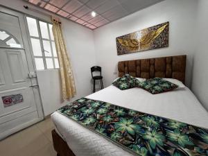 Postel nebo postele na pokoji v ubytování Habitación con baño privado 2 + 4 fotografie