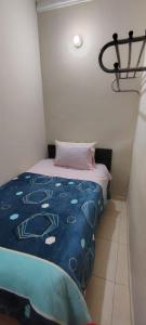 Cama o camas de una habitación en Hospedaje CASA REAL