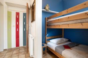 Postel nebo postele na pokoji v ubytování Blankwasserweg 131 Lensterstrand Oase Bungalow 4