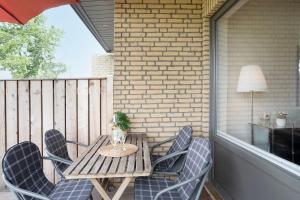 Balkón nebo terasa v ubytování Blankwasserweg 131 Lensterstrand Oase Bungalow 4