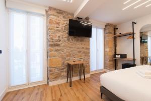 Μια τηλεόραση ή/και κέντρο ψυχαγωγίας στο Boulevard Roomss