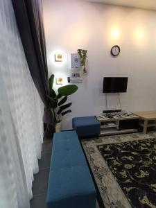 TV a/nebo společenská místnost v ubytování Homestay faleeq