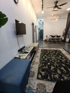 TV a/nebo společenská místnost v ubytování Homestay faleeq