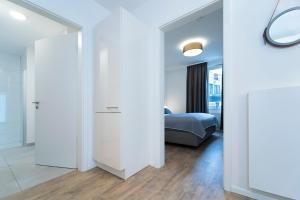Postel nebo postele na pokoji v ubytování KellenHus Wohnung 3