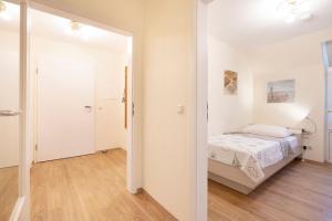 Postel nebo postele na pokoji v ubytování Lindenbuschen 2 Wohnung 5