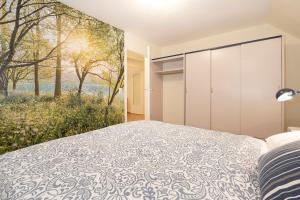 Postel nebo postele na pokoji v ubytování Lindenbuschen 2 Wohnung 5
