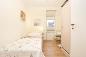 Postel nebo postele na pokoji v ubytování Lindenbuschen 2 Wohnung 5