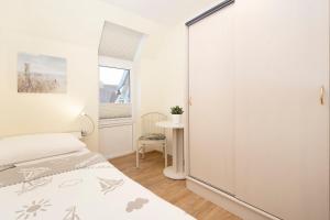 Postel nebo postele na pokoji v ubytování Lindenbuschen 2 Wohnung 5