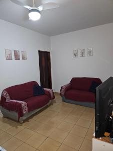 Posezení v ubytování Casa familiar e espaçosa em Aparecida SP, com 3 quartos
