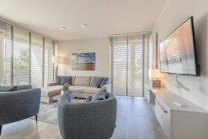 TV a/nebo společenská místnost v ubytování Sonne und Meer Wohnung 1
