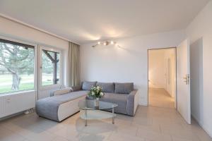 Χώρος καθιστικού στο Golfresidenz Wohnung B004