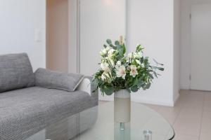 Χώρος καθιστικού στο Golfresidenz Wohnung B004