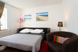 Voodi või voodid majutusasutuse Ein Tag am Meer toas