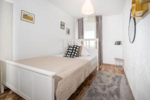 Postel nebo postele na pokoji v ubytování Charmante Privatzimmer in der Stadt