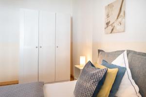 Postel nebo postele na pokoji v ubytování Charmante Privatzimmer in der Stadt