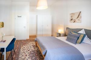 Postel nebo postele na pokoji v ubytování Charmante Privatzimmer in der Stadt
