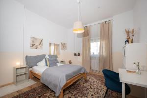 Postel nebo postele na pokoji v ubytování Charmante Privatzimmer in der Stadt