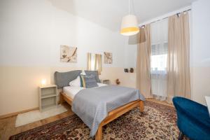 Postel nebo postele na pokoji v ubytování Charmante Privatzimmer in der Stadt