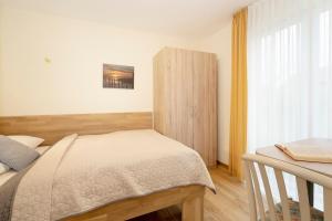 Postel nebo postele na pokoji v ubytování Lindenbuschen 2 Wohnung 3