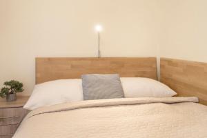 Postel nebo postele na pokoji v ubytování Lindenbuschen 2 Wohnung 3