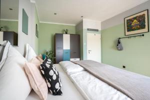 Postel nebo postele na pokoji v ubytování Charmante Privatzimmer in der Stadt