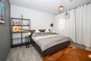 Postel nebo postele na pokoji v ubytování Charmante Privatzimmer in der Stadt