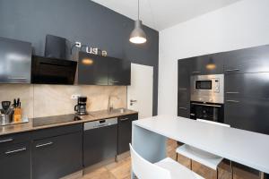 Kuchyň nebo kuchyňský kout v ubytování Charmante Privatzimmer in der Stadt