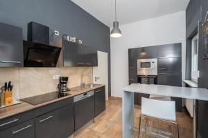 Kuchyň nebo kuchyňský kout v ubytování Charmante Privatzimmer in der Stadt
