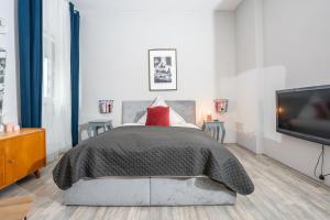 TV a/nebo společenská místnost v ubytování Charmante Privatzimmer in der Stadt