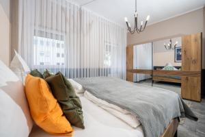 Postel nebo postele na pokoji v ubytování Charmante Privatzimmer in der Stadt