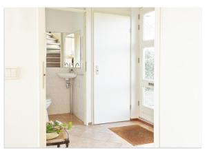 a bathroom with a toilet and a sink at Holiday Home in Terherne near Scenic Friesland in Terherne
