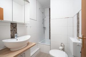 Koupelna v ubytování Deichhof 3a Dünenwind