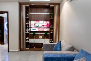 TV a/nebo společenská místnost v ubytování حياة ابها ريزيدنس