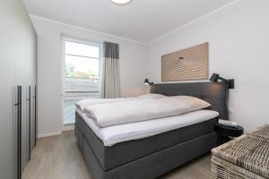 Postel nebo postele na pokoji v ubytování Haffkamp 23 Wohnung 3