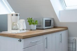 Kuchyň nebo kuchyňský kout v ubytování Haus MeerReet ReetGlück + 31 fotografií
