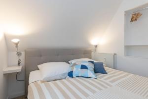Postel nebo postele na pokoji v ubytování Haus MeerReet ReetGlück