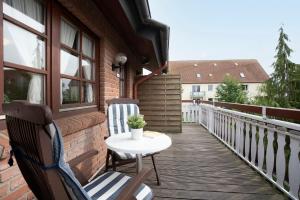 Ein Balkon oder eine Terrasse in der Unterkunft Ostseegarten Goldulme