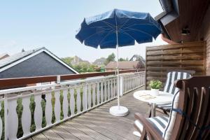 Ein Balkon oder eine Terrasse in der Unterkunft Ostseegarten Goldulme