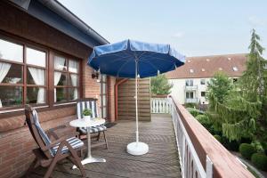 Ein Balkon oder eine Terrasse in der Unterkunft Ostseegarten Goldulme