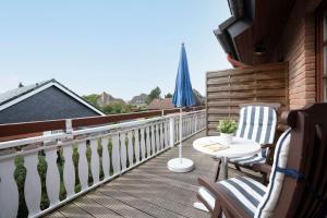 Ein Balkon oder eine Terrasse in der Unterkunft Ostseegarten Goldulme